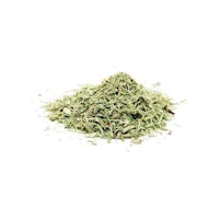 a pile of dried herbs on a white background