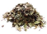 a pile of dried leaves on a white background