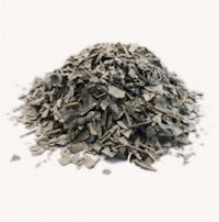 a pile of charcoal chips on a white background