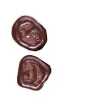 two chocolate candies on a white background