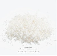 a pile of white coconut on a white background