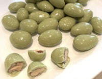 green almonds on a white plate