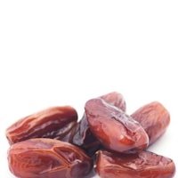 a pile of dates on a white background