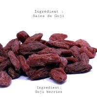 a pile of goji berries on a white background