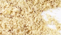 a pile of flour on a white surface