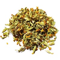 a pile of dried chamomile flowers on a white background
