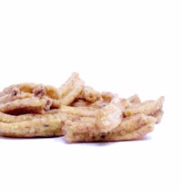 a pile of fried noodles on a white background