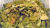 a pile of dried leaves in a white box