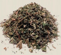 a pile of dried herbs on a white background
