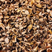 a close up of a pile of dried herbs