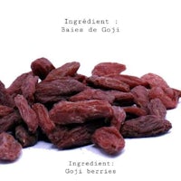 a pile of goji berries on a white background