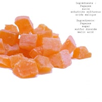 a pile of orange cubes on a white background