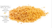a pile of coconut flakes on a white background