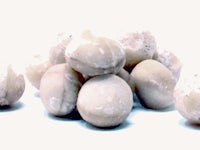 a pile of white marbles on a white surface